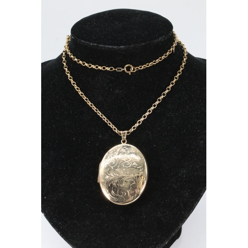 179 - A large 9ct gold locket on 9ct gold chain (approx. 30g)