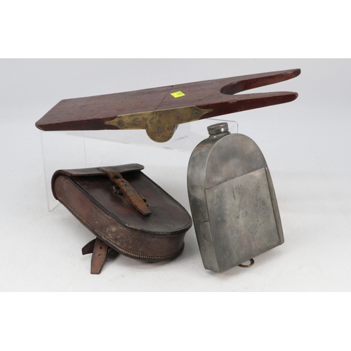 104 - Campaign pewter sandwich box with leather case together with a mahogany and brass boot pull.