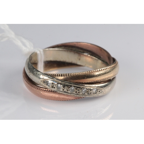 176 - A 9ct tri-gold ring set with diamonds (4.8g)