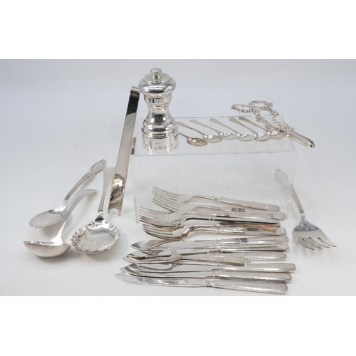 18 - Six small silver spoons, a silver hallmarked pepperette and a selection of plated flatware to includ... 