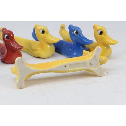 63 - Selection of highly coloured French? ceramic knife rests in the form of animals