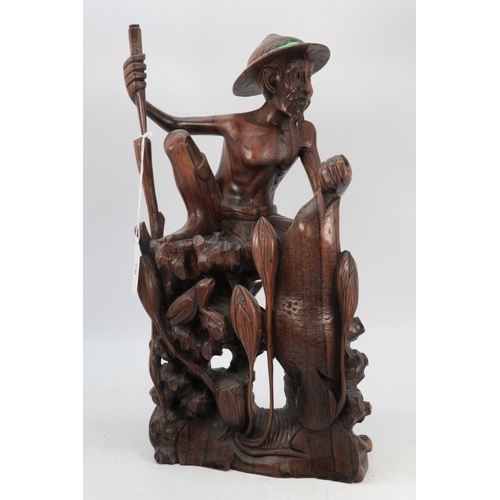 76 - Carved wooden oriental fisherman