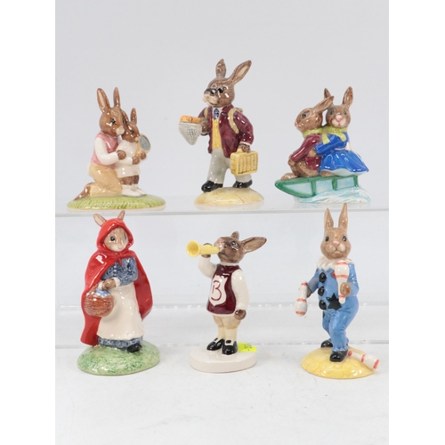 89 - Six Royal Doulton Bunnykins to include Juggler DB164, Harry the Herald DB49, Sleigh Ride DB4, Little... 