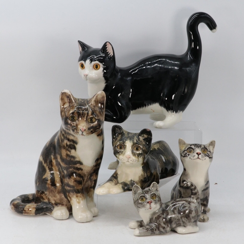 351 - Four Winstanley cat ornaments, two larger have chips to ears, smaller seated cat has had tail repair... 