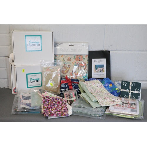 357 - A selection of assorted fabric to include fat quarters etc (crate not included)