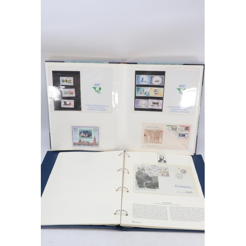 550 - Album of Nobel prize stamps, FDCs etc together with a album of commemorative mint stamps with sheets... 