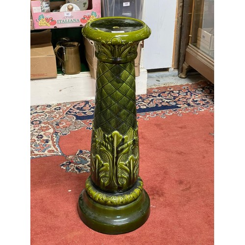 466 - A green ceramic art nouveau style jardinere stand (approx. 77cm tall)