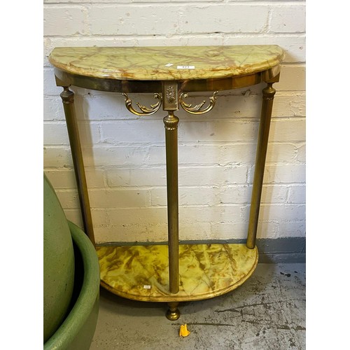 471 - A vintage gilt metal demi lune table with onyx top and shelf