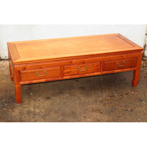 29 - Contemporary low table with three drawers measures approx. 122cm w x 51cm d x 41cm h