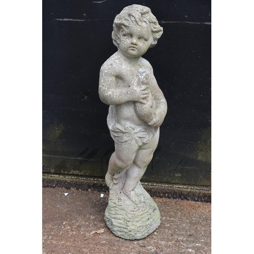 58 - Composite stone classical boy holding fish water feature measures approx. 80cm tall