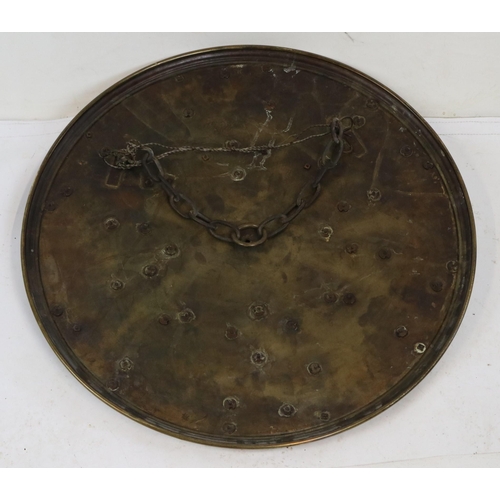 127 - Unusual 19th century brass and copper circular plaque embossed with roundel scenes from the Swiss ''... 