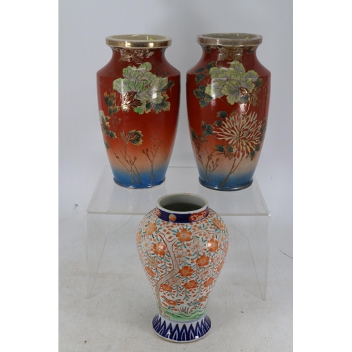 192 - Pair of Japanese satsuma vases together with an Imari ballister vase