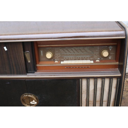 213 - 1958 Blaupunkt Arkansas radiogram with built in Garrard record dec with cocktail cabinet under with ... 