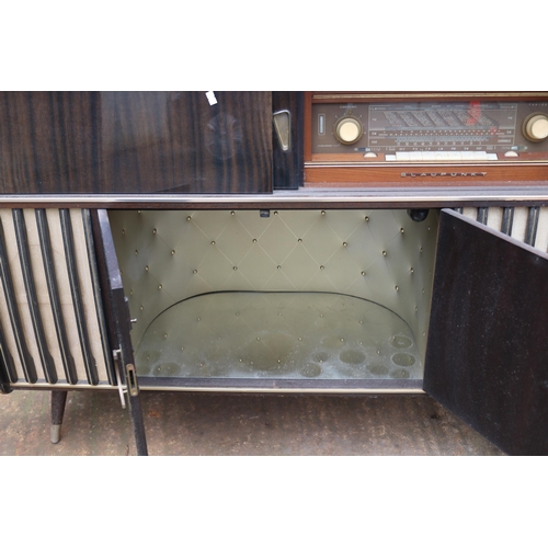 213 - 1958 Blaupunkt Arkansas radiogram with built in Garrard record dec with cocktail cabinet under with ... 