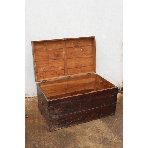 214 - Antique strap work chest (no key) iron handles to ends, measures approx. 93cm w x 55cm d x 49cm h