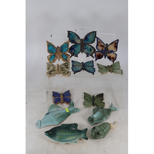 227 - A selection of ceramic butterflies, fish ornaments etc