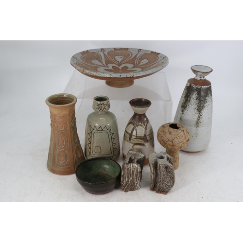 240 - Nine studio pottery items, some marked