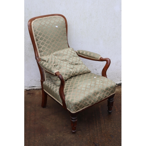 355 - Upholstered arm chair with serpentine legs and carved front legs (not damage to one arm)