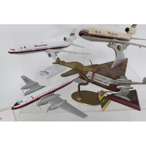 356 - A collection of model aircraft, some diecast and many Skytrain aircraft. Included are some pilot aid... 