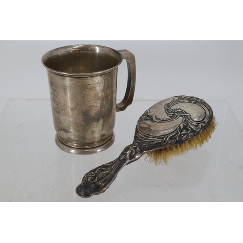 2 - Sterling silver tankard with presentation inscription dated 1938 together with a silver back hairbru... 