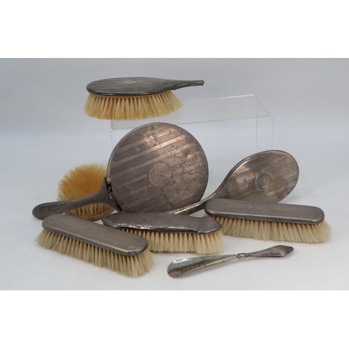 49 - Two silver topped hairbrushes, two broken silver backed mirrors, and another broken hairbrush