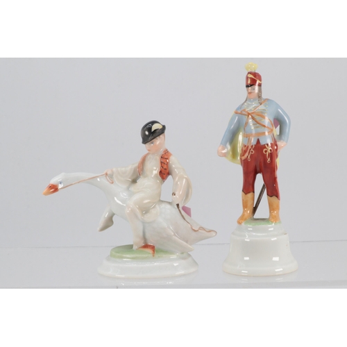 62 - Two Herend porcelain small figures (approx. 10.5cm tall and the other 7.5cm tall)