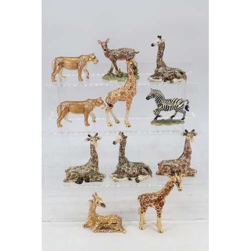 133 - A selection of metal trinket pots in the form of giraffes, and other wild animals