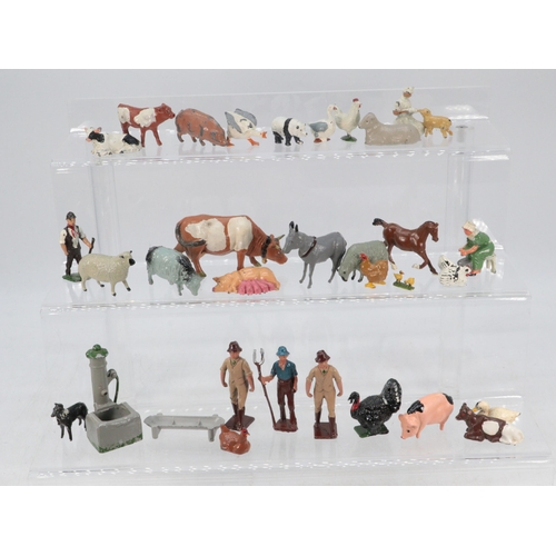 143 - Good quantity of vintage hollow cast farm figures, animals and accessories, some are Britain's and o... 