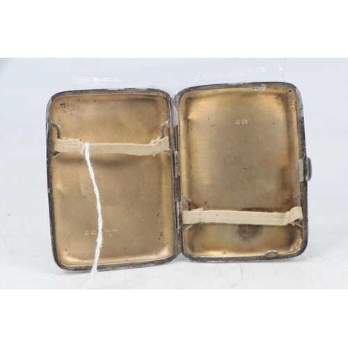 10 - A silver hallmarked cigarette case with Dartmouth crest to front (approx weight. 79g)