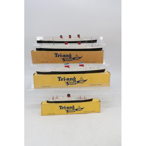 155 - Five boxed Triang Minic 1:1200 scale ocean liners to include Aquitania, SS France, HMS Queen Elizabe... 