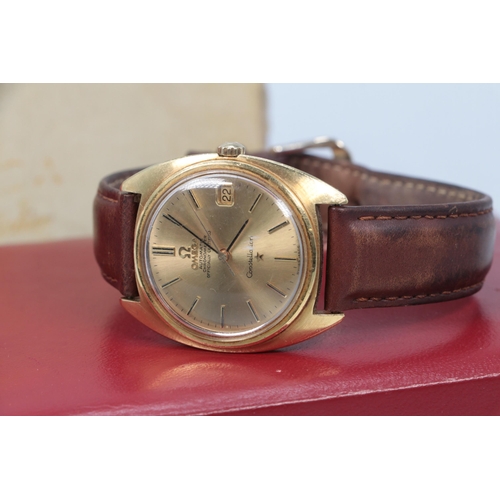 183 - An Omega Constellation 18ct gold cased watch with leather strap