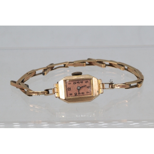 185 - A 9ct gold cased and 9ct gold flexi strap cocktail watch (overall weight 11g)