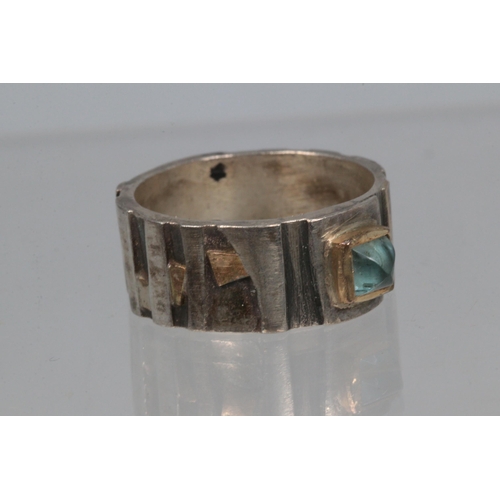 199 - silver 925 mourning ring set with light blue stone and gold overlaid.