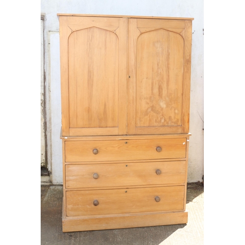 27 - Pine linen press measures approx. 125cm w x 57cm d x 204cm h