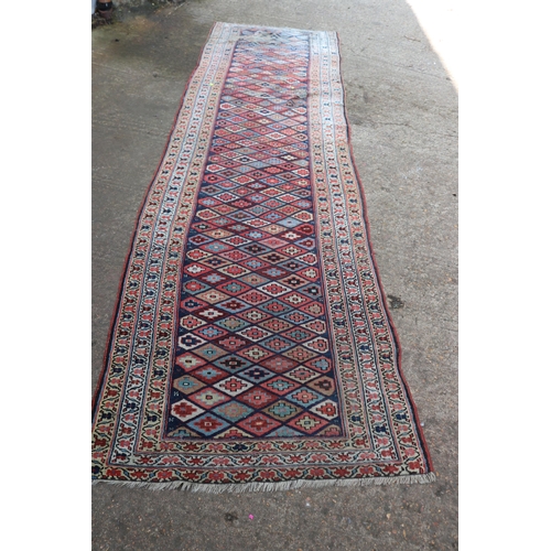 46 - Two floor rugs together with one runner all with wear, one rug measures approx. 125cm x 224cm the ot... 