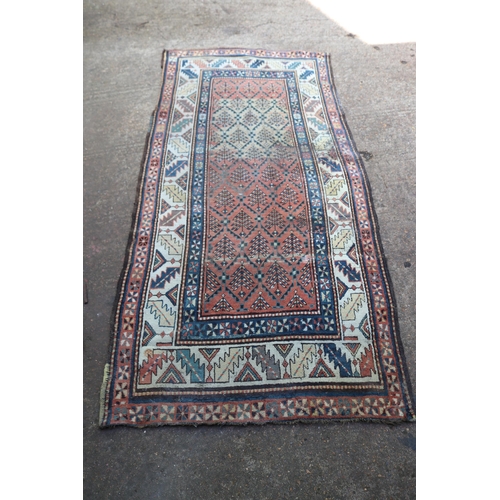 46 - Two floor rugs together with one runner all with wear, one rug measures approx. 125cm x 224cm the ot... 