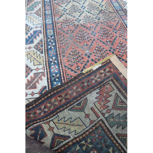 46 - Two floor rugs together with one runner all with wear, one rug measures approx. 125cm x 224cm the ot... 