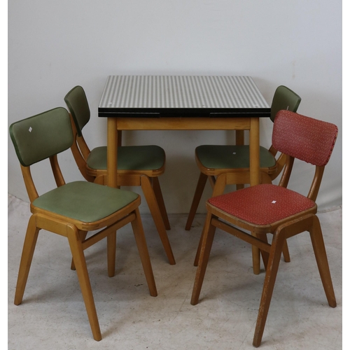 97 - Extending vintage Formica kitchen table together with four chairs,measures approx. 71cm w x 61cm d x... 