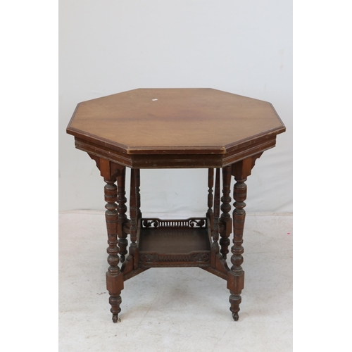 102 - Octagonal table with lower gallery measures approx. 76cm x 75cm h