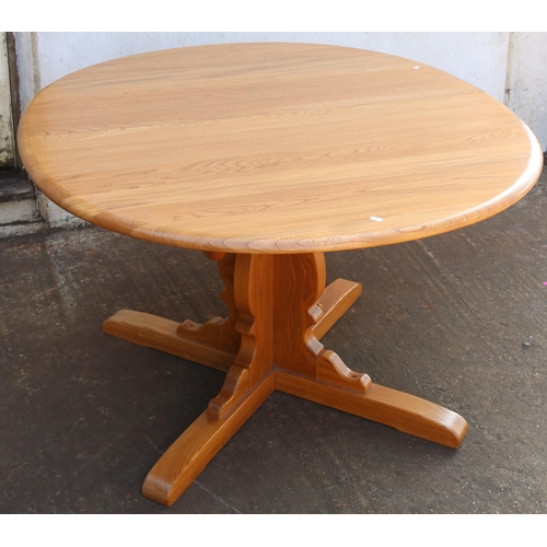 128 - Ercol dining table with extending leaf measures approx. 129cm w x 115cm d x (38cm extending leaf)