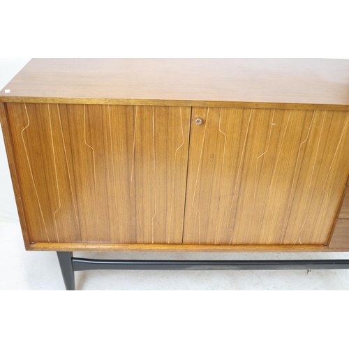 155 - A mid century Wrighton brothers sideboard with jigsaw decoration to cupboard doors measures approx. ... 