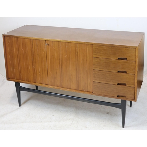 155 - A mid century Wrighton brothers sideboard with jigsaw decoration to cupboard doors measures approx. ... 