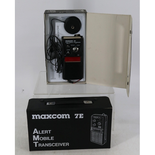 257 - A pair of boxed Maxcom 7E Alert Mobile Transceivers. Untested. Note, one missing Ariel.