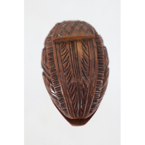 7A - Carved nut shell snuff box