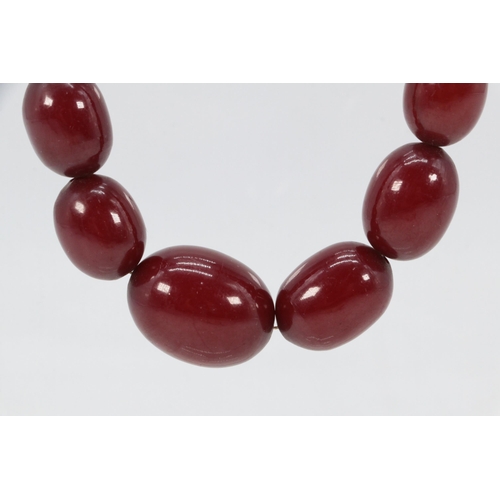 310 - A single string of cherry amber necklace (approx.42g)