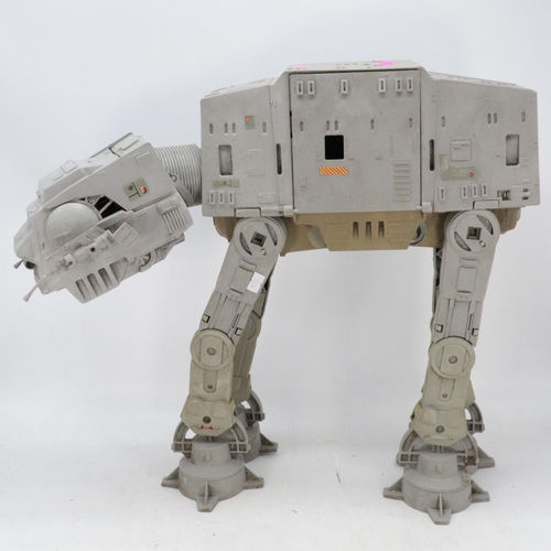 682 - A Star Wars vintage AT-AT walker (missing grappling hook and two clear plastic light up lasers, bulb... 