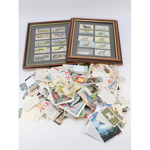 573A - Large quantity of cigarette and tea cards some stuck in albums, some loose etc