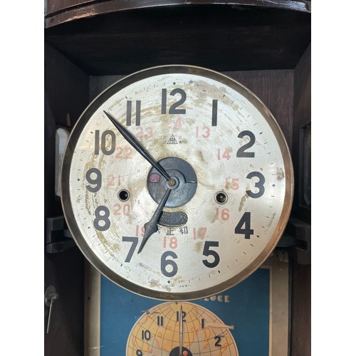 694 - A Chung Hwa Shanghai calendar clock with pendulum with handwritten instructions (no key)