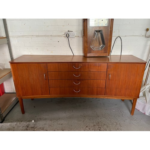 686 - A Gordon Russell for Heals sideboard with cupboards at ends, four drawers including cutlery drawer. ... 