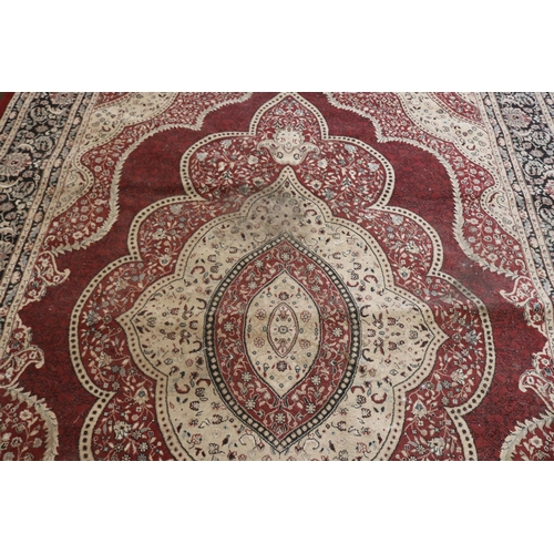 83 - Isfahan rug with red ground 240cm x 320cm (note wear)